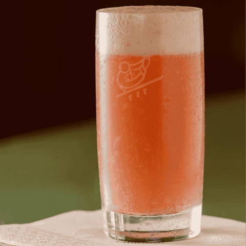 A glass of Cipriani non-alcoholic peach Bellini