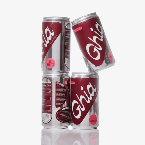 Four cans of Ghia Le Spritz on display