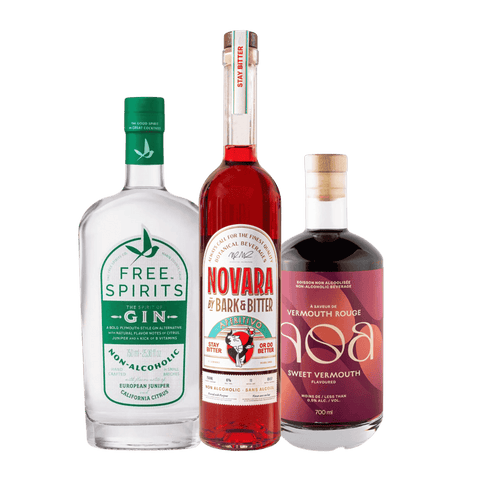 A non-alcoholic cocktail bundle featuring three bottles labeled as 'Free Spirits Gin', 'Bark & Bitter Novara', and 'NOA Sweet Vermouth'. All bottles are colored in shades of green and red, indicating the flavor profile of each product.