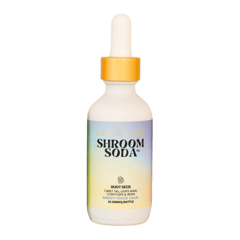 A bottle of Shroom Soda Root Beer Adaptogenic Mushroom Drops