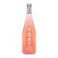 TOST Sparkling Rose Tea | Non-Alcoholic Sparkling Wine Alternative, with white tea, ginger, and elderberry. Wine alternative for any special occasion. Available now in large 750ml bottles in Calgary at Santé Dry Bottle Shop!