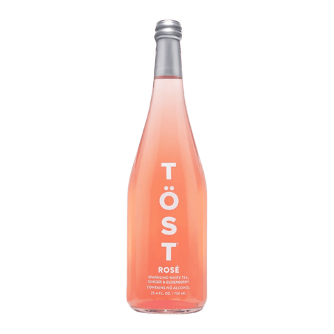 TOST Sparkling Rose Tea | Non-Alcoholic Sparkling Wine Alternative, with white tea, ginger, and elderberry. Wine alternative for any special occasion. Available now in large 750ml bottles in Calgary at Santé Dry Bottle Shop!