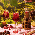 A bottle of Sangria Siesta Mushroom Mocktails being mixed into a pitcher of sangria