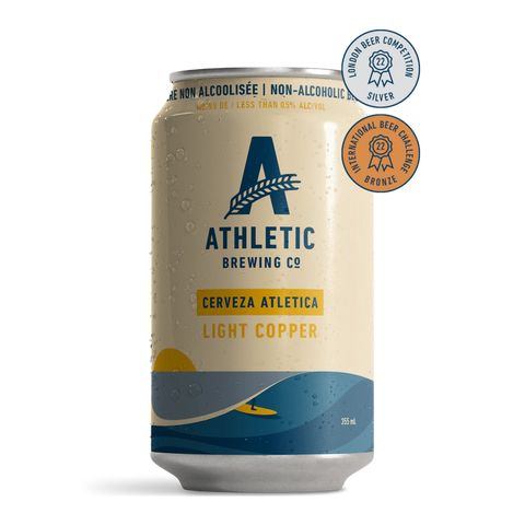 A can of Athletic Brewing Cerveza Atletica Light Copper with a blue and yellow design, indicating it is a non-alcoholic beer.