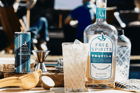 A bottle of Free Spirits non-alcoholic tequila mixed into a margarita