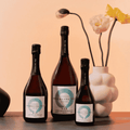Three different sized bottles of Copenhagen BLÅ Sparkling Tea