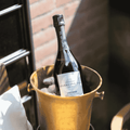 A bottle of Copenhagen LYSEGRØN Sparkling Tea in an ice bucket
