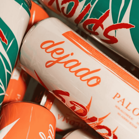 Close up image of cans of Dejado non-alcoholic spicy paloma and spicy margarita