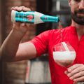 Delirium Delirio | Non-Alcoholic Belgian Blonde Ale with a touch of hop bitterness and spice. Available at Santé Dry Bottle Shop in Calgary