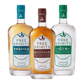 Three bottles of non-alcoholic spirits by Free Spirits. Bourbon, Gin, and Tequila.