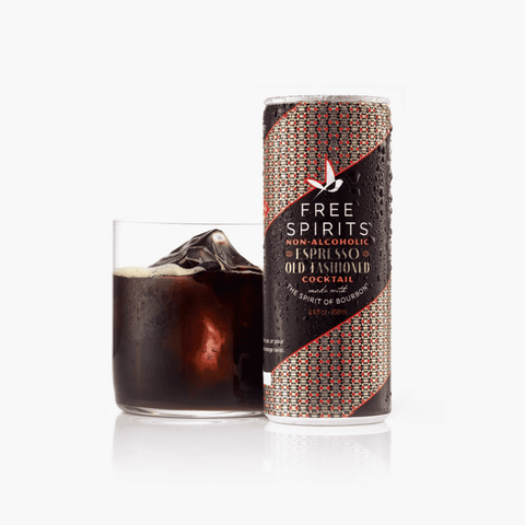 A can of Free Spirits Espresso Old Fashioned non-alcoholic cocktail poured into a rocks glass over ice.