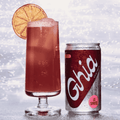 A can of Ghia Le Spritz non-alcoholic cocktail poured into a glass