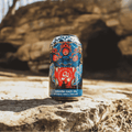 A can of Go Brewing Disarm non-alcoholic Hazy IPA displayed on a rock