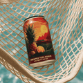 Can of non-alcoholic Pineapple Yuzu Radler by Go-Brewing on a hammock.