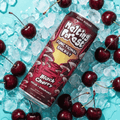 A can of Melting Forest Black Cherry Energy Drink on a bed of ice and cherries