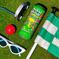 A can of Melting Forest Mango Guava Functional Energy Drink on a putting green