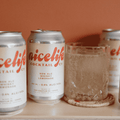 Three cans of NiceLife Cocktail Co. non-alcoholic Whisky Lemonade