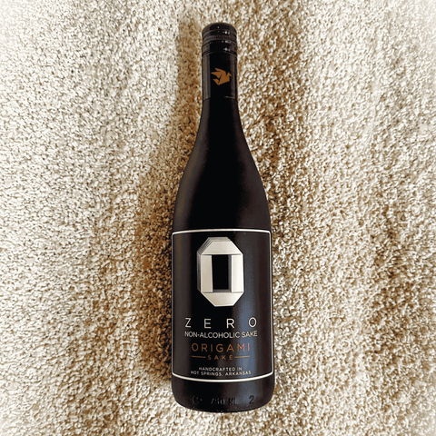 Bottle of Origami Sake on a bed of rice