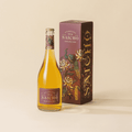 A bottle of Saicho Sparkling Darjeeling Tea with a gift box