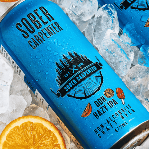 A displayed can of Sober Carpenter's DDH Hazy IPA on ice