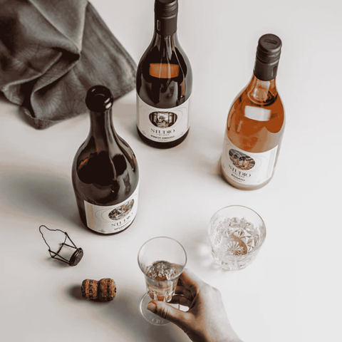Three bottles of non-alcoholic wine by Studio Italiano