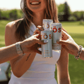 Three cans of TOST Sparkling Tea