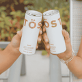 Two cans of TOST Original Sparkling Tea