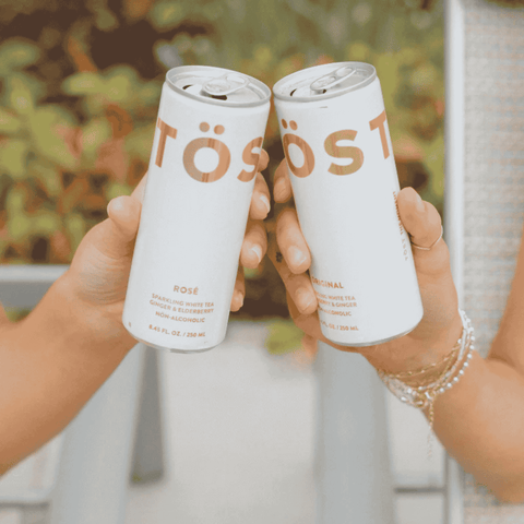 Two cans of TOST Original Sparkling Tea